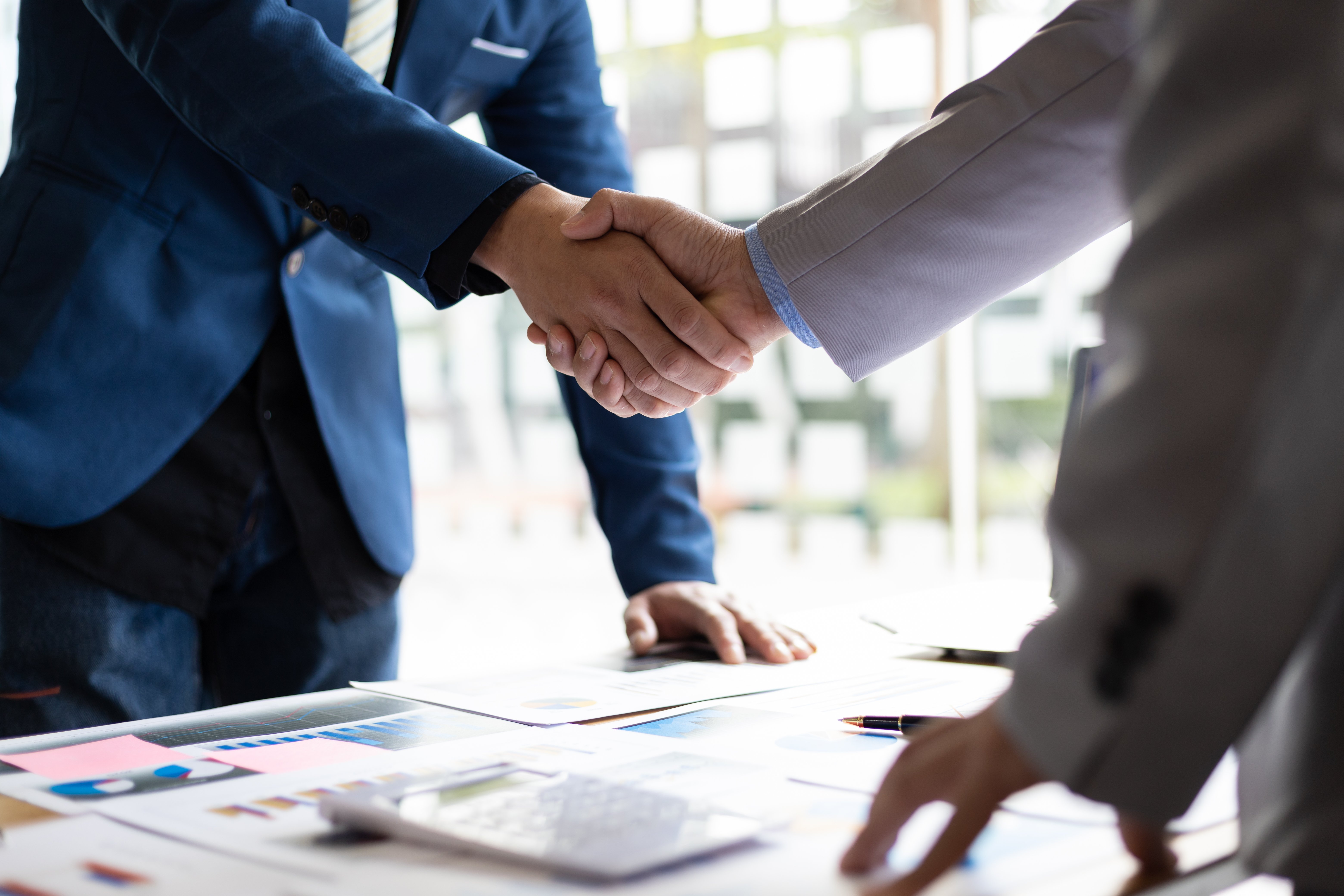 Handshake between business men